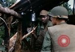 Image of US Army 11th Armored Cavalry Regiment search mission South Vietnam, 1967, second 32 stock footage video 65675021193