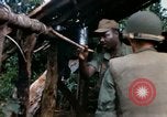 Image of US Army 11th Armored Cavalry Regiment search mission South Vietnam, 1967, second 33 stock footage video 65675021193
