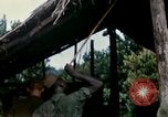 Image of US Army 11th Armored Cavalry Regiment search mission South Vietnam, 1967, second 54 stock footage video 65675021193