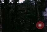 Image of 196th Light infantry burns NVA huts Vietnam, 1968, second 17 stock footage video 65675021199