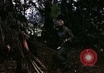 Image of 196th Light infantry burns NVA huts Vietnam, 1968, second 21 stock footage video 65675021199
