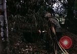 Image of 196th Light infantry burns NVA huts Vietnam, 1968, second 25 stock footage video 65675021199