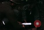 Image of 196th Light infantry burns NVA huts Vietnam, 1968, second 33 stock footage video 65675021199
