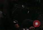 Image of 196th Light infantry burns NVA huts Vietnam, 1968, second 36 stock footage video 65675021199