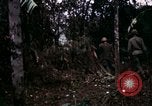 Image of 196th Light infantry burns NVA huts Vietnam, 1968, second 53 stock footage video 65675021199