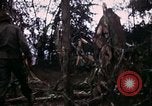 Image of 196th Light infantry burns NVA huts Vietnam, 1968, second 57 stock footage video 65675021199