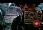 Image of U.S. Army 196th Lt Inf Brigade knock down damaged building wall Vietnam, 1968, second 1 stock footage video 65675021200