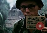 Image of U.S. Army 196th Lt Inf Brigade knock down damaged building wall Vietnam, 1968, second 3 stock footage video 65675021200