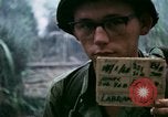 Image of U.S. Army 196th Lt Inf Brigade knock down damaged building wall Vietnam, 1968, second 5 stock footage video 65675021200