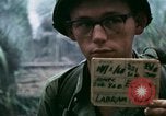 Image of U.S. Army 196th Lt Inf Brigade knock down damaged building wall Vietnam, 1968, second 6 stock footage video 65675021200