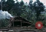 Image of U.S. Army 196th Lt Inf Brigade knock down damaged building wall Vietnam, 1968, second 12 stock footage video 65675021200