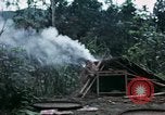 Image of U.S. Army 196th Lt Inf Brigade knock down damaged building wall Vietnam, 1968, second 13 stock footage video 65675021200