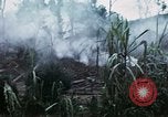 Image of U.S. Army 196th Lt Inf Brigade knock down damaged building wall Vietnam, 1968, second 16 stock footage video 65675021200