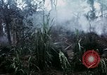 Image of U.S. Army 196th Lt Inf Brigade knock down damaged building wall Vietnam, 1968, second 18 stock footage video 65675021200