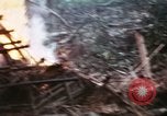 Image of U.S. Army 196th Lt Inf Brigade knock down damaged building wall Vietnam, 1968, second 25 stock footage video 65675021200