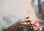 Image of U.S. Army 196th Lt Inf Brigade knock down damaged building wall Vietnam, 1968, second 29 stock footage video 65675021200