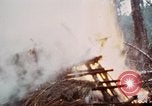 Image of U.S. Army 196th Lt Inf Brigade knock down damaged building wall Vietnam, 1968, second 30 stock footage video 65675021200