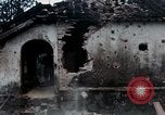 Image of U.S. Army 196th Lt Inf Brigade knock down damaged building wall Vietnam, 1968, second 31 stock footage video 65675021200