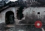 Image of U.S. Army 196th Lt Inf Brigade knock down damaged building wall Vietnam, 1968, second 32 stock footage video 65675021200