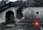 Image of U.S. Army 196th Lt Inf Brigade knock down damaged building wall Vietnam, 1968, second 34 stock footage video 65675021200