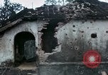 Image of U.S. Army 196th Lt Inf Brigade knock down damaged building wall Vietnam, 1968, second 36 stock footage video 65675021200