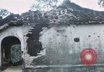 Image of U.S. Army 196th Lt Inf Brigade knock down damaged building wall Vietnam, 1968, second 38 stock footage video 65675021200