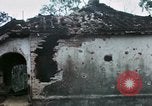 Image of U.S. Army 196th Lt Inf Brigade knock down damaged building wall Vietnam, 1968, second 39 stock footage video 65675021200