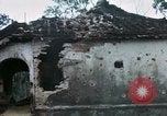 Image of U.S. Army 196th Lt Inf Brigade knock down damaged building wall Vietnam, 1968, second 40 stock footage video 65675021200