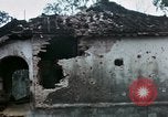 Image of U.S. Army 196th Lt Inf Brigade knock down damaged building wall Vietnam, 1968, second 42 stock footage video 65675021200