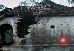 Image of U.S. Army 196th Lt Inf Brigade knock down damaged building wall Vietnam, 1968, second 43 stock footage video 65675021200