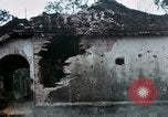 Image of U.S. Army 196th Lt Inf Brigade knock down damaged building wall Vietnam, 1968, second 45 stock footage video 65675021200