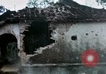 Image of U.S. Army 196th Lt Inf Brigade knock down damaged building wall Vietnam, 1968, second 47 stock footage video 65675021200