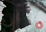 Image of U.S. Army 196th Lt Inf Brigade knock down damaged building wall Vietnam, 1968, second 49 stock footage video 65675021200