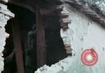 Image of U.S. Army 196th Lt Inf Brigade knock down damaged building wall Vietnam, 1968, second 50 stock footage video 65675021200