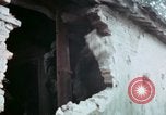 Image of U.S. Army 196th Lt Inf Brigade knock down damaged building wall Vietnam, 1968, second 52 stock footage video 65675021200
