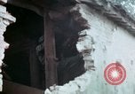 Image of U.S. Army 196th Lt Inf Brigade knock down damaged building wall Vietnam, 1968, second 53 stock footage video 65675021200