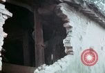 Image of U.S. Army 196th Lt Inf Brigade knock down damaged building wall Vietnam, 1968, second 54 stock footage video 65675021200