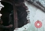 Image of U.S. Army 196th Lt Inf Brigade knock down damaged building wall Vietnam, 1968, second 56 stock footage video 65675021200
