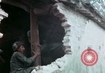 Image of U.S. Army 196th Lt Inf Brigade knock down damaged building wall Vietnam, 1968, second 57 stock footage video 65675021200