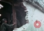 Image of U.S. Army 196th Lt Inf Brigade knock down damaged building wall Vietnam, 1968, second 58 stock footage video 65675021200