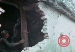 Image of U.S. Army 196th Lt Inf Brigade knock down damaged building wall Vietnam, 1968, second 59 stock footage video 65675021200