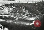 Image of US Army soldiers prepare for gas attack in World War 1 trench France, 1918, second 8 stock footage video 65675021500