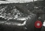 Image of US Army soldiers prepare for gas attack in World War 1 trench France, 1918, second 9 stock footage video 65675021500