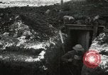 Image of US Army soldiers prepare for gas attack in World War 1 trench France, 1918, second 10 stock footage video 65675021500