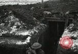 Image of US Army soldiers prepare for gas attack in World War 1 trench France, 1918, second 11 stock footage video 65675021500