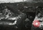 Image of US Army soldiers prepare for gas attack in World War 1 trench France, 1918, second 13 stock footage video 65675021500