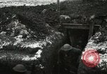 Image of US Army soldiers prepare for gas attack in World War 1 trench France, 1918, second 14 stock footage video 65675021500