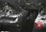 Image of US Army soldiers prepare for gas attack in World War 1 trench France, 1918, second 17 stock footage video 65675021500