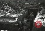 Image of US Army soldiers prepare for gas attack in World War 1 trench France, 1918, second 18 stock footage video 65675021500