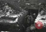 Image of US Army soldiers prepare for gas attack in World War 1 trench France, 1918, second 19 stock footage video 65675021500